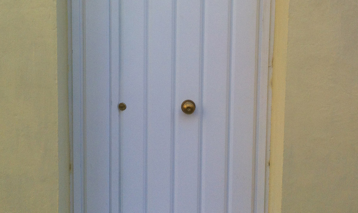 Puerta entrada de chapa duela